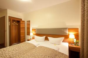 Hotel Frankfurt Messe客房内的一张或多张床位