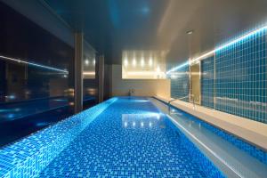 Bazén v ubytování Hotel Resol Trinity Naha nebo v jeho okolí