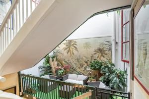 Balkón nebo terasa v ubytování Hôtel des Arceaux