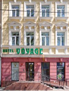 a building with a sign that reads hotel converge at Voyage in Odesa