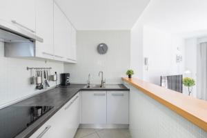 A kitchen or kitchenette at MEDANO4YOU La Terraza Los Martines