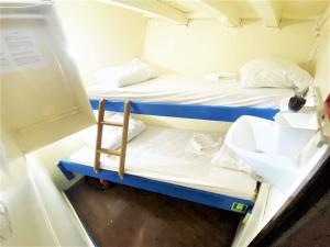 Postel nebo postele na pokoji v ubytování Rhythm Floating Hostel - Zadar