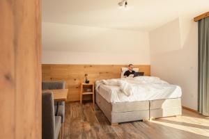 Łóżko lub łóżka w pokoju w obiekcie Maglian Campus