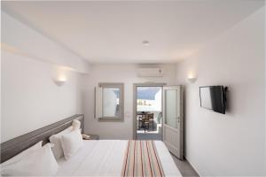 Katil atau katil-katil dalam bilik di Hotel Goulielmos