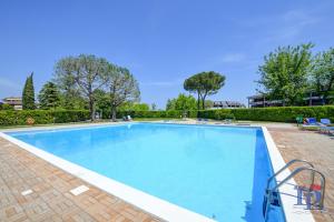 The swimming pool at or close to Desenzanoloft Official Partner MARRIOTT Homes & Villas - Dolce vita with Garden and Pools