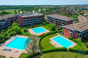 The swimming pool at or close to Desenzanoloft Official Partner MARRIOTT Homes & Villas - Dolce vita with Garden and Pools