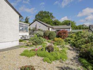 a garden in front of a house at Westwinds in Grange Over Sands