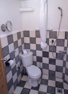 Ένα μπάνιο στο USHA Guest House