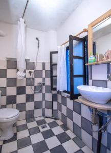 Ένα μπάνιο στο USHA Guest House
