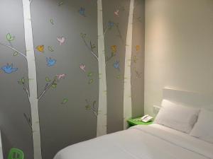 Ένα ή περισσότερα κρεβάτια σε δωμάτιο στο Hotel Strawberry Fields