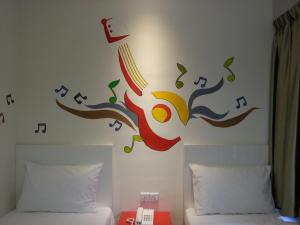 Ένα ή περισσότερα κρεβάτια σε δωμάτιο στο Hotel Strawberry Fields