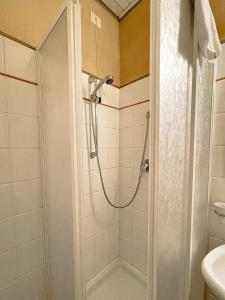 a bathroom with a shower and a sink at Eremo Montemezzano in Pratovecchio