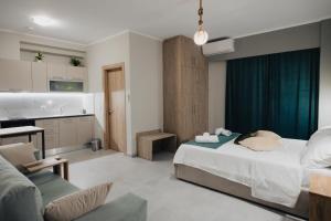 Posteľ alebo postele v izbe v ubytovaní Savere luxury studios