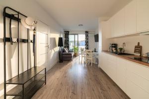Kuchyňa alebo kuchynka v ubytovaní BALTICUS APARTAMENT