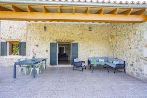 A patio or other outdoor area at Pou Monjo