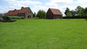 Ein Garten an der Unterkunft B&B De Hulst
