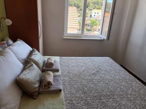 Postel nebo postele na pokoji v ubytování Apartment Teuta