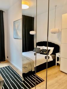Posteľ alebo postele v izbe v ubytovaní Jan III Sobieski - Luksusowy apartament L z darmowym prywatnym parkingiem