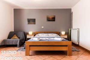 Postel nebo postele na pokoji v ubytování Glamour Apartments Vrsar