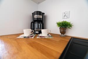 Príslušenstvo na prípravu kávy alebo čaju v ubytovaní BALTICUS APARTAMENT