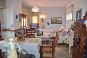A restaurant or other place to eat at Yades elegant villa 2 minutes away from the beach