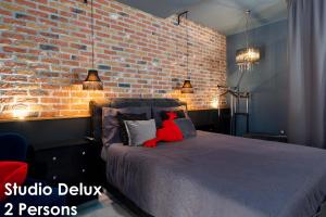 Postel nebo postele na pokoji v ubytování Glamour Apartments Vrsar