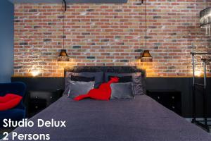 Postel nebo postele na pokoji v ubytování Glamour Apartments Vrsar