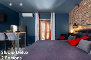 Postel nebo postele na pokoji v ubytování Glamour Apartments Vrsar