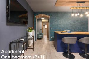 TV a/nebo společenská místnost v ubytování Glamour Apartments Vrsar