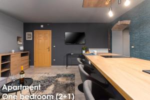TV a/nebo společenská místnost v ubytování Glamour Apartments Vrsar