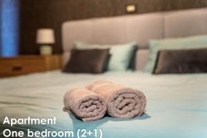 Postel nebo postele na pokoji v ubytování Glamour Apartments Vrsar