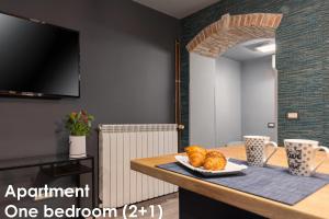 TV a/nebo společenská místnost v ubytování Glamour Apartments Vrsar