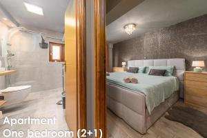 Postel nebo postele na pokoji v ubytování Glamour Apartments Vrsar