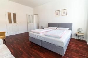 Posteľ alebo postele v izbe v ubytovaní Comfortable Apartments Vienna 1100 with contactless Check-in