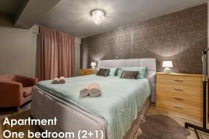 Postel nebo postele na pokoji v ubytování Glamour Apartments Vrsar