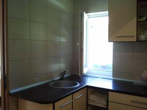 Kuchyň nebo kuchyňský kout v ubytování JR Motel + 14 fotografií