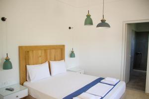 Postel nebo postele na pokoji v ubytování Villa Dimitris