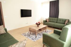 Ein Sitzbereich in der Unterkunft Kıvanç Residence