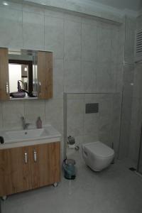 Ein Badezimmer in der Unterkunft Kıvanç Residence