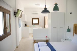 Postel nebo postele na pokoji v ubytování Villa Dimitris
