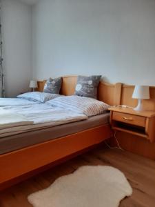 Ferienwohnung Evi tesisinde bir odada yatak veya yataklar