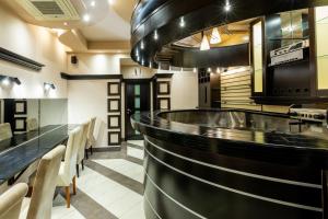 Kuchyň nebo kuchyňský kout v ubytování Hotel Vila Lago