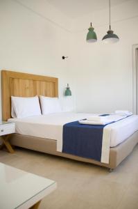 Postel nebo postele na pokoji v ubytování Villa Dimitris
