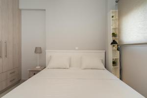 Voodi või voodid majutusasutuse Cozy Apt. 2min from metro toas