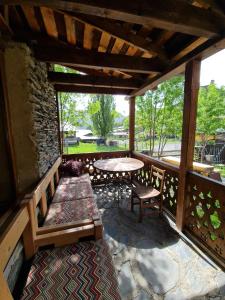 Posezení v ubytování Guest House Shina