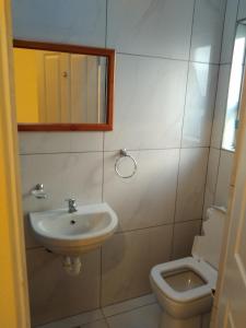 Ένα μπάνιο στο Jacmo Guest house