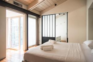 Posteľ alebo postele v izbe v ubytovaní YouHosty - Luxury Town House