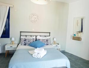 Postel nebo postele na pokoji v ubytování Allegria Family Hotel