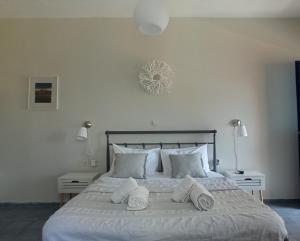 Postel nebo postele na pokoji v ubytování Allegria Family Hotel