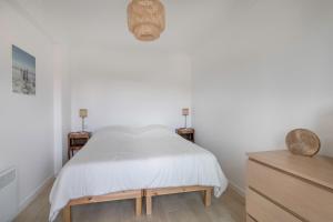 Posteľ alebo postele v izbe v ubytovaní À 500m de la plage, appartement pour 7